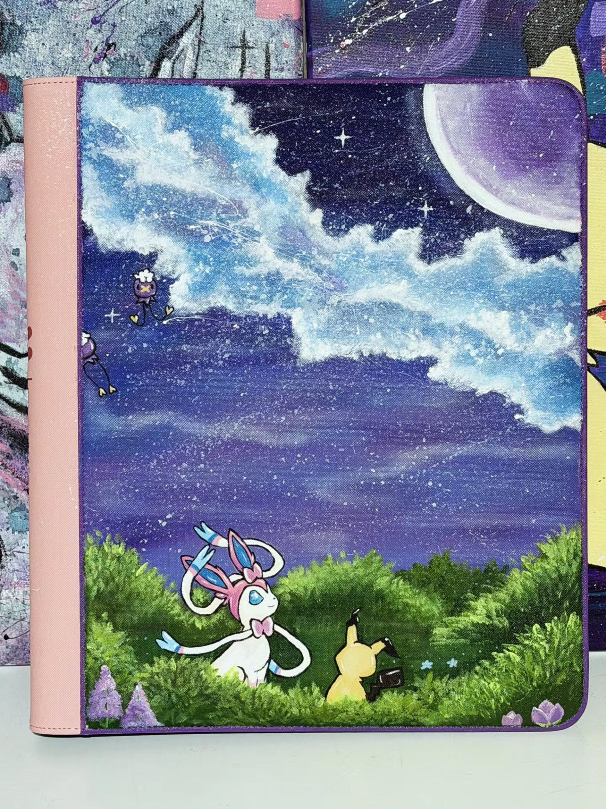 Hand painted top loader binder original sylveon and mimikyu artwork by 5/14 apparel