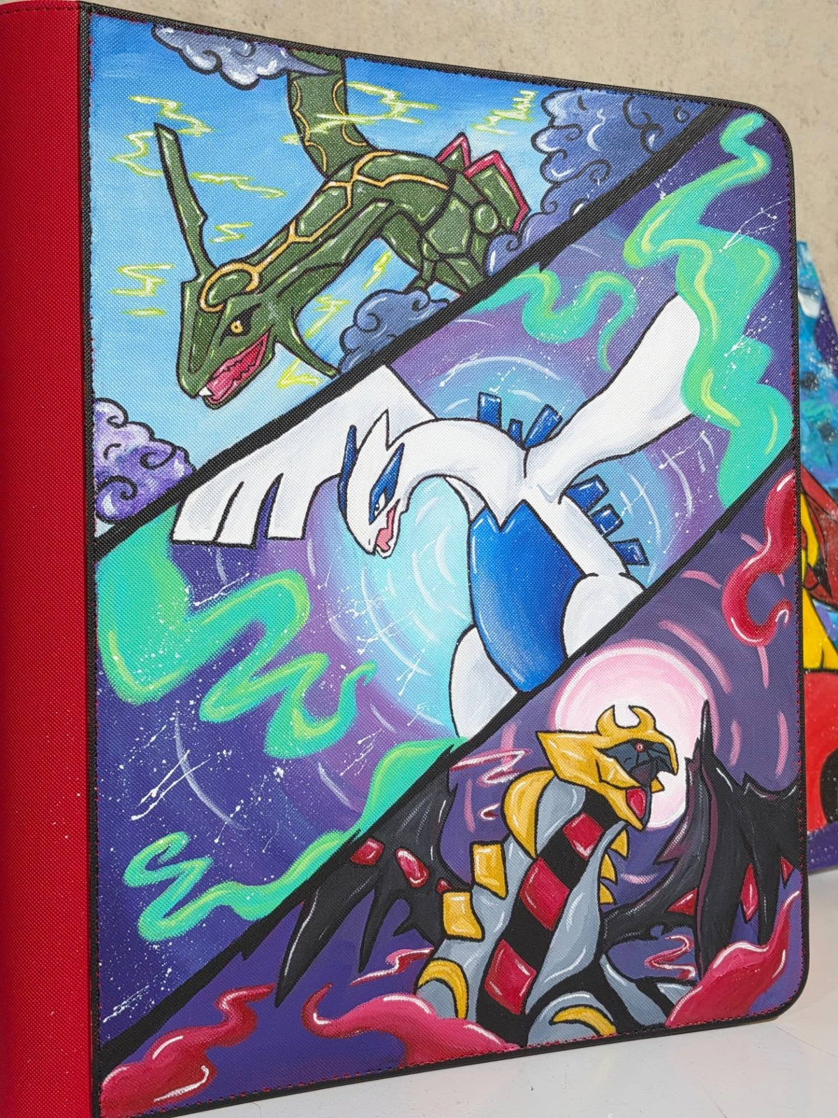 Custom Pokémon toploader binder by 5/14 Apparel — built for serious card collectors