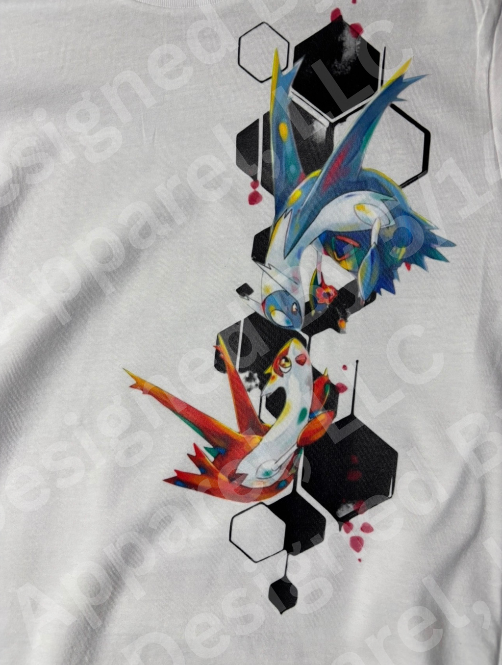 Close-up of Latios and Latias graphic on white tee — Latios in blue and Latias in red soaring through black hexagon geometric design by 5/14 Apparel