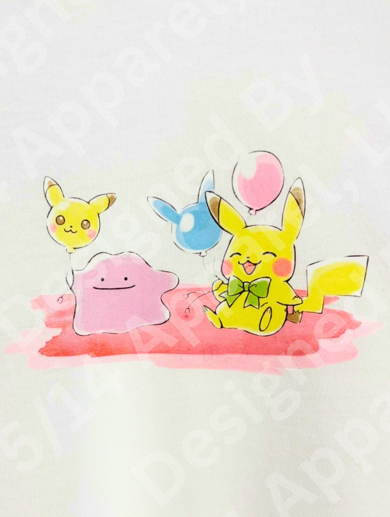 Close-up of the Ditto and Pikachu graphic artwork printed on the crop tee