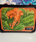Front view of custom hand-painted Charizard limited quantity 3-row slab case — orange Charizard diving through lush green treetops with flame tail on orange background, loving charmander freehand acrylic artwork by 5/14 Apparel