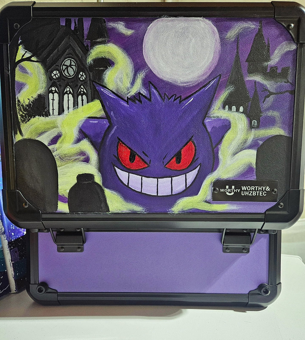 Front view of custom hand-painted Gengar 3-row slab case — purple Gengar with red eyes and wide grin surrounded by neon green ghost energy on purple background, freehand acrylic artwork by 5/14 Apparel