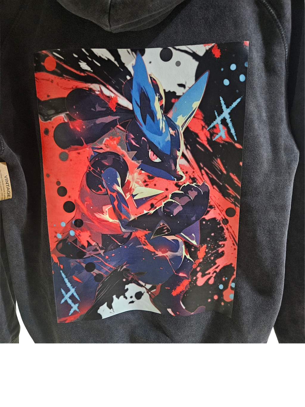 Side close-up of Lucario full back graphic on mineral wash black hoodie — bold red and blue Lucario artwork by 5/14 Apparel