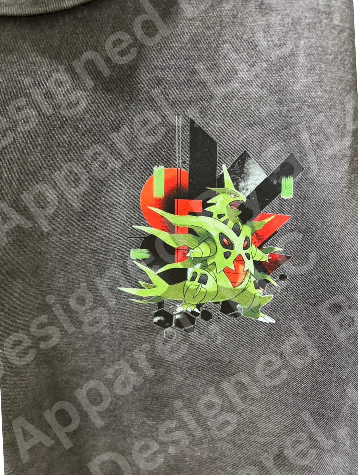 Close-up of Mega Tyranitar geometric shatter graphic on vintage black wash tee — Mega Tyranitar in green with red and black diamond shatter design by 5/14 Apparel
